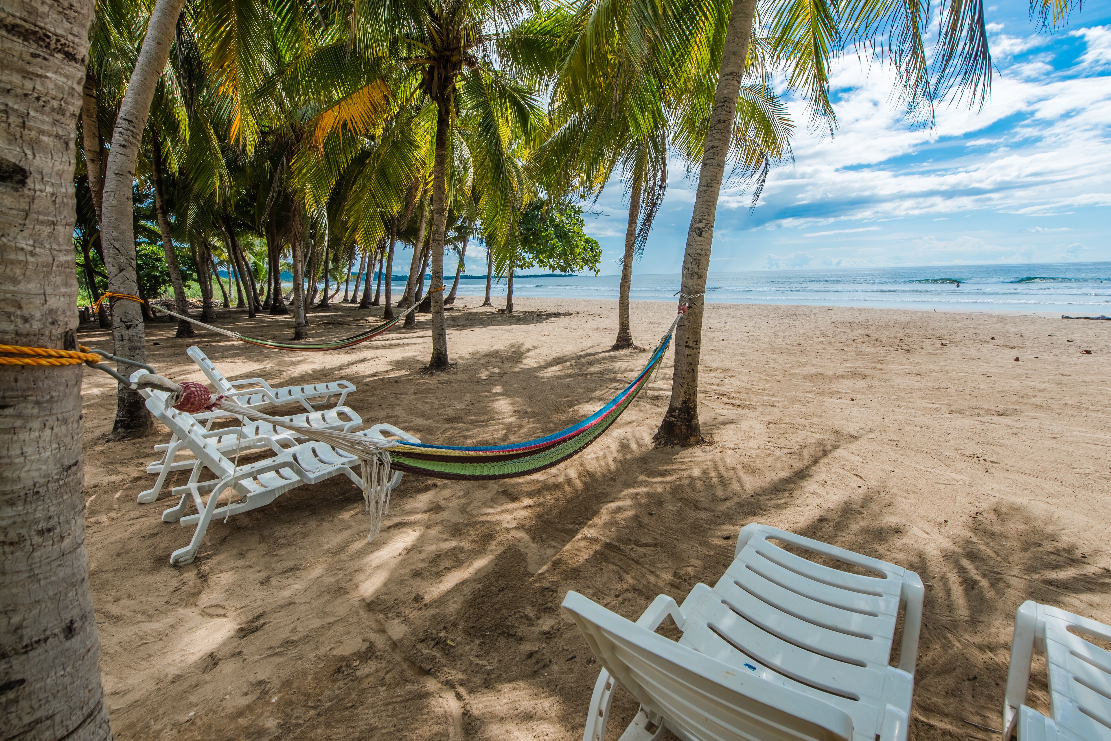 On the beach, sun loungers, beach towels