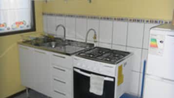 Apartament familiar, 2 dormitoris | Cuina privada | Frigorífic, microones, placa de cuina i arrossera