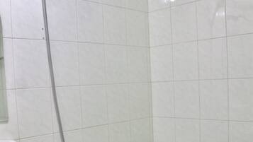 Hair dryer, towels, shampoo, toilet paper