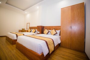 Standard Quadruple Room | Minibar, in-room safe, desk, soundproofing - Hong Tung Hotel (Da Lat)