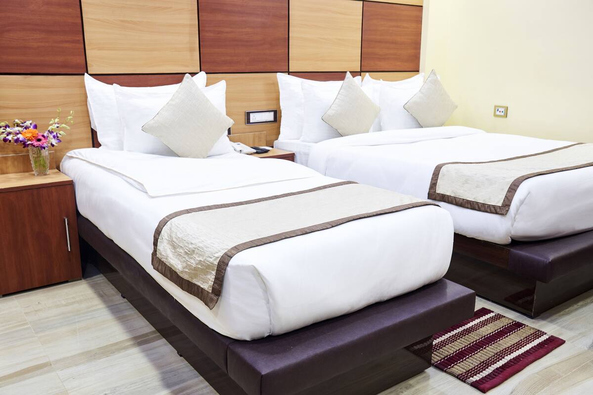 Habitación superior | Ropa de cama de alta calidad, insonorización y wifi gratis 