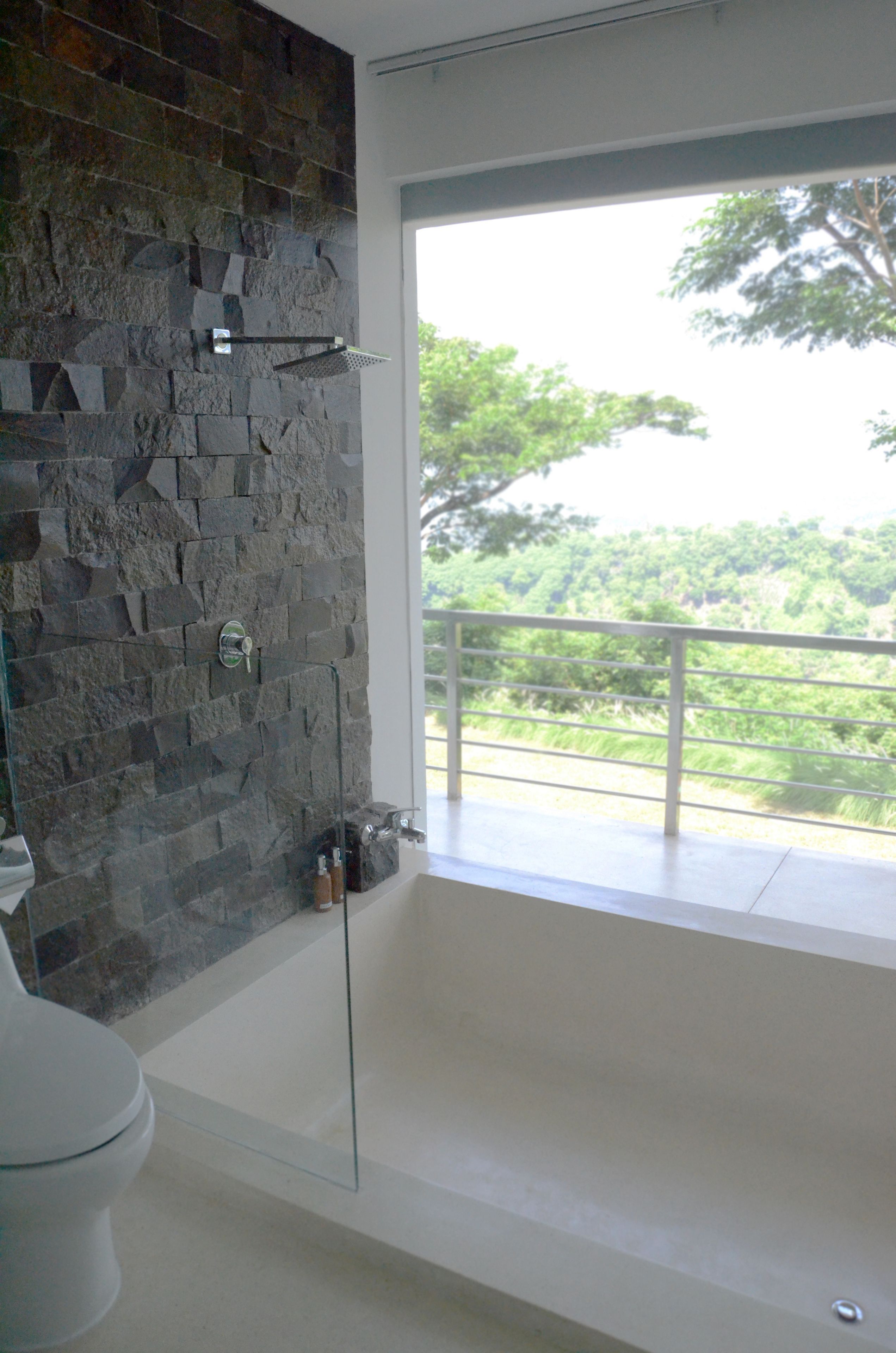 Separate tub and shower, free toiletries, hair dryer, slippers