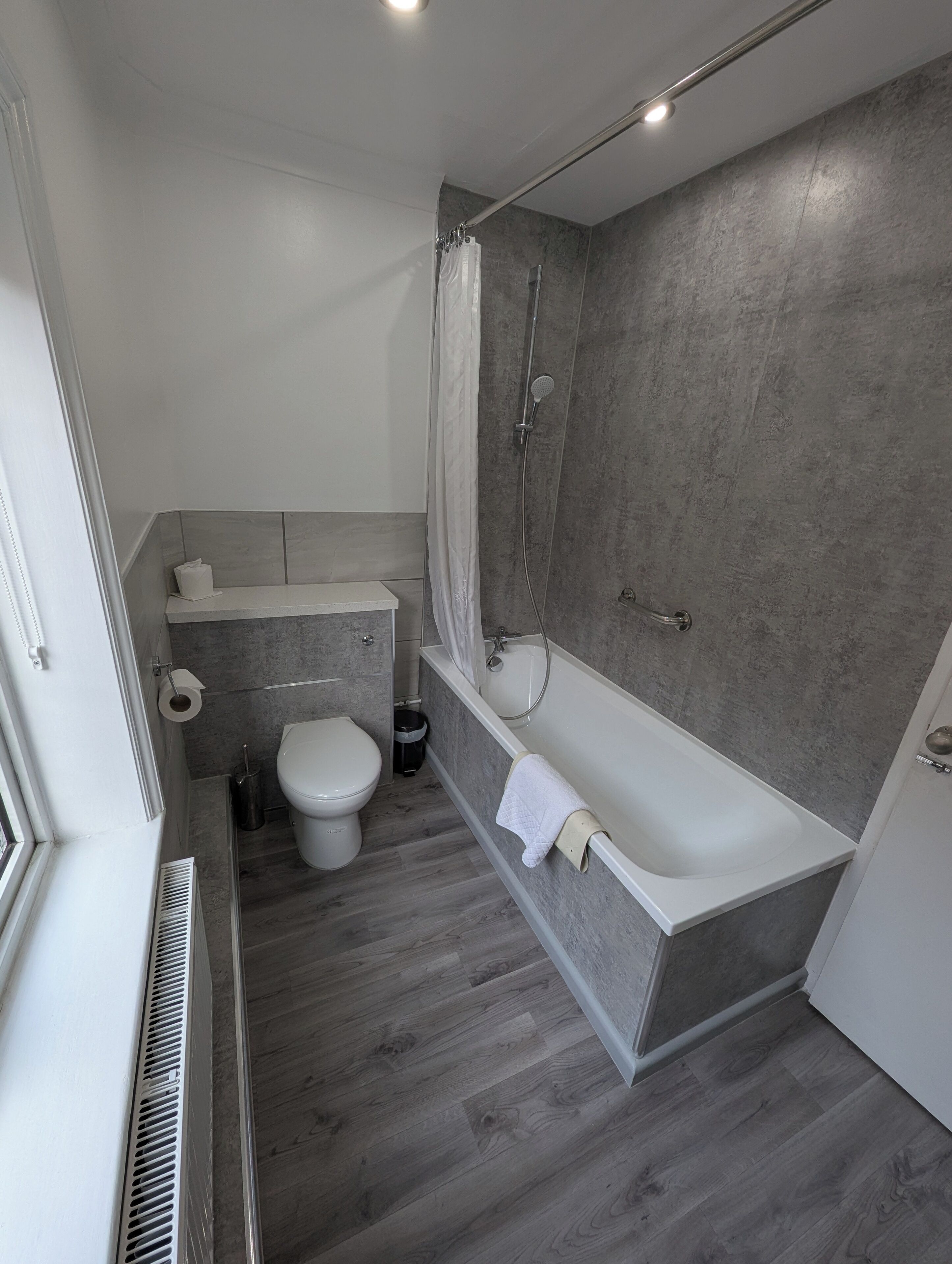 family room | bathroom | combined shower/bathtub, free toiletries, hair dryer, towels