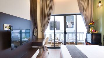 Colchones con pillow-top, minibar, escritorio y cortinas blackout