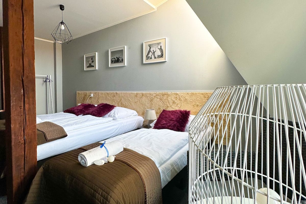 Premium bedding, blackout curtains, iron/ironing board (on request)