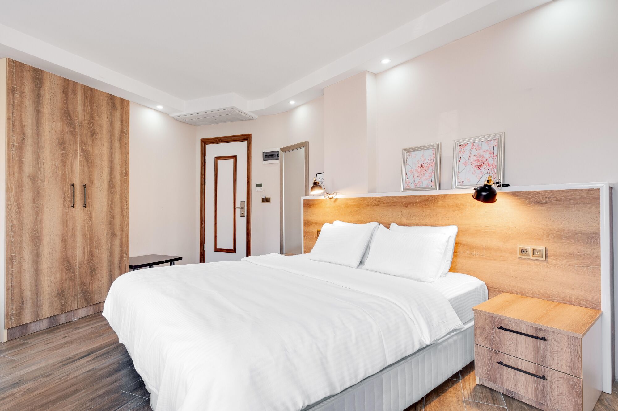 standard quadruple room, multiple beds, non smoking | minibar, desk, laptop workspace, iron/ironing board