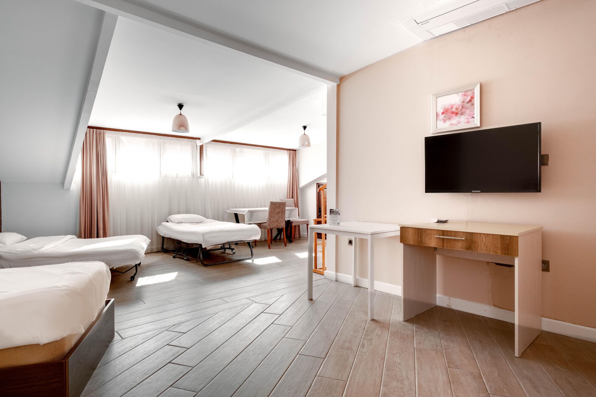 family double or twin room | minibar, desk, laptop workspace, iron/ironing board