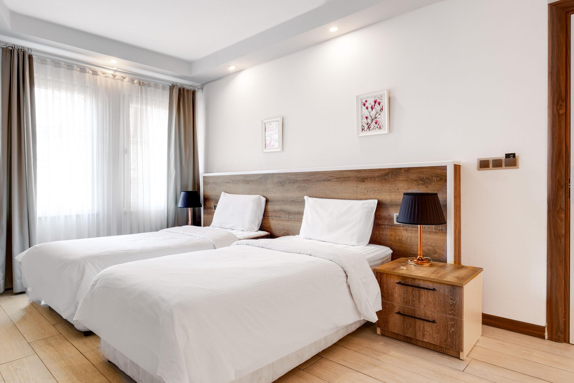 standard quadruple room, multiple beds, non smoking | minibar, desk, laptop workspace, iron/ironing board