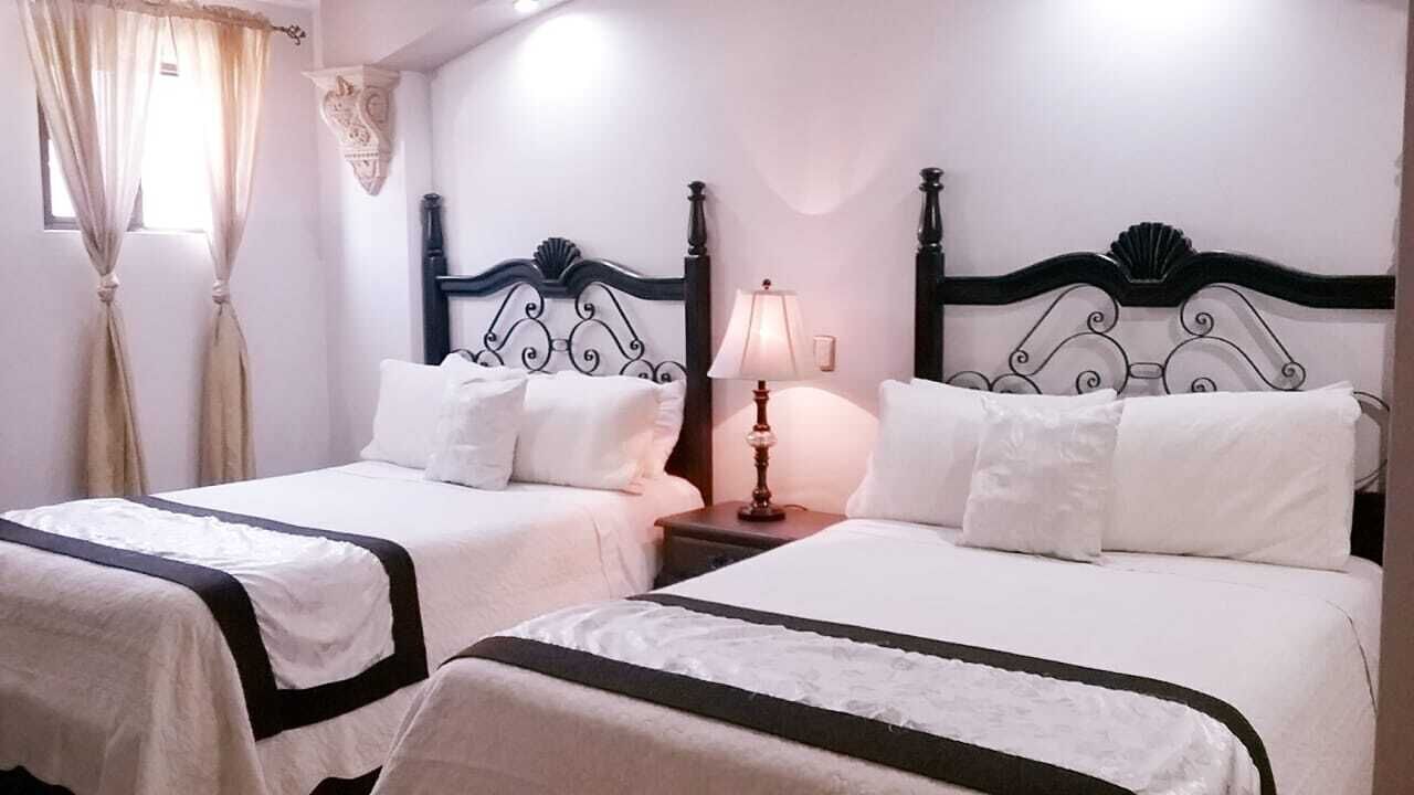 Minibar, caja de seguridad en la habitación, wifi gratis y ropa de cama 