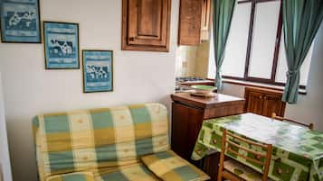 Appartement, vue mer | Restauration dans la chambre