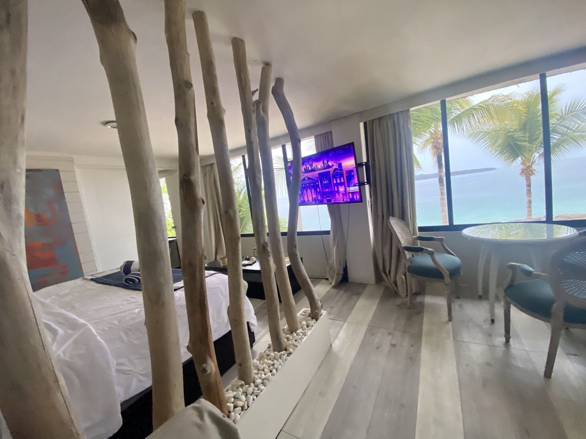 Signature Suite, Non Smoking, Ocean View | Down duvets, pillow-top beds, in-room safe, individually decorated