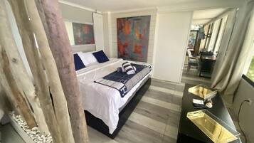 Down duvets, pillow-top beds, in-room safe, individually decorated