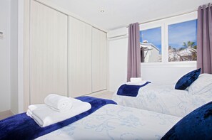 4 bedrooms, in-room safe, iron/ironing board, travel cot