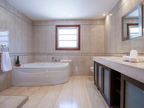 Bathtub, hair dryer, towels