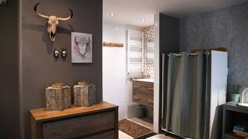 Shower, hair dryer, towels, soap