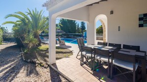 An outdoor patio with a pool, seating area, and a pergola. - Beautiful, Private Family Villa with Great Pool and access to Beaches, Mountains (Monte Canelas, Nr Alvor, District of Portimão)