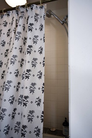 Bathtub, jetted bath, towels, soap
