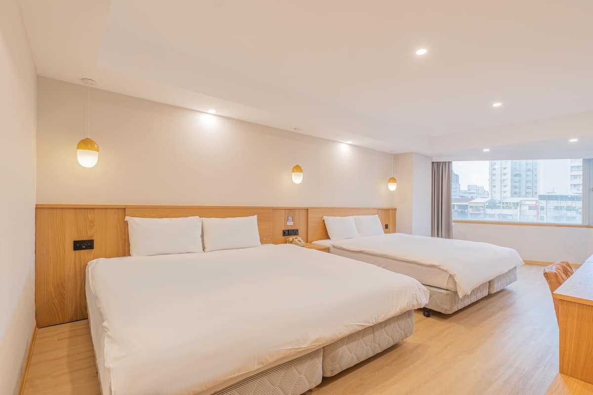 Deluxe Quadruple Room | 1 bedroom, desk, laptop workspace, soundproofing
