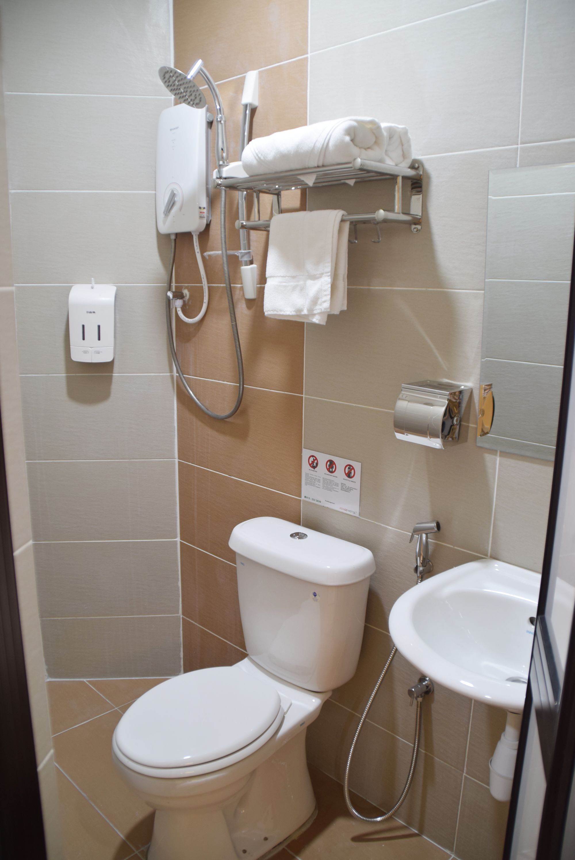 twin room (without window) | bathroom | shower, free toiletries, hair dryer, bidet