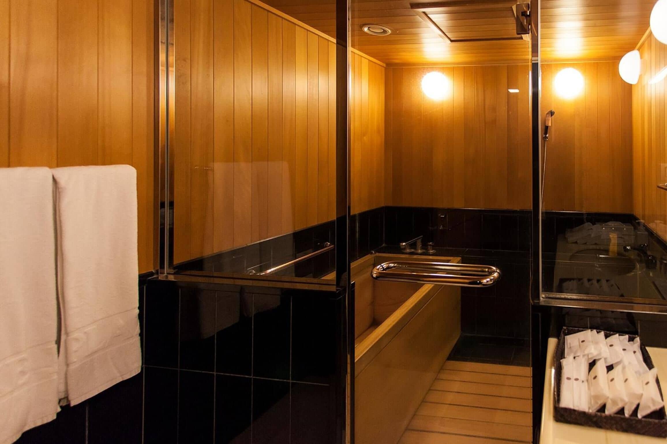 separate bathtub and shower, free toiletries, hair dryer, slippers