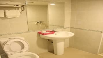 Shower, free toiletries, hair dryer, slippers