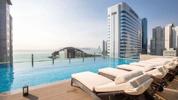 Outdoor pool, open 8:00 AM to 10:00 PM, cabanas (surcharge)