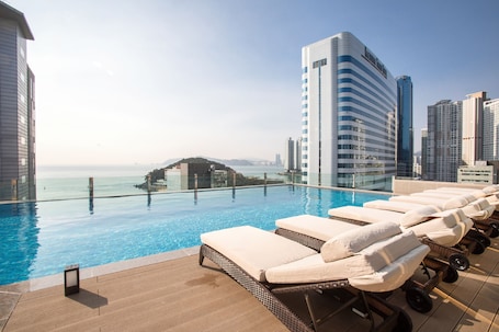 Outdoor pool, open 8:00 AM to 10:00 PM, cabanas (surcharge)