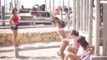 Guests can enjoy the beachside pier, perfect for taking in the views and watching activities.