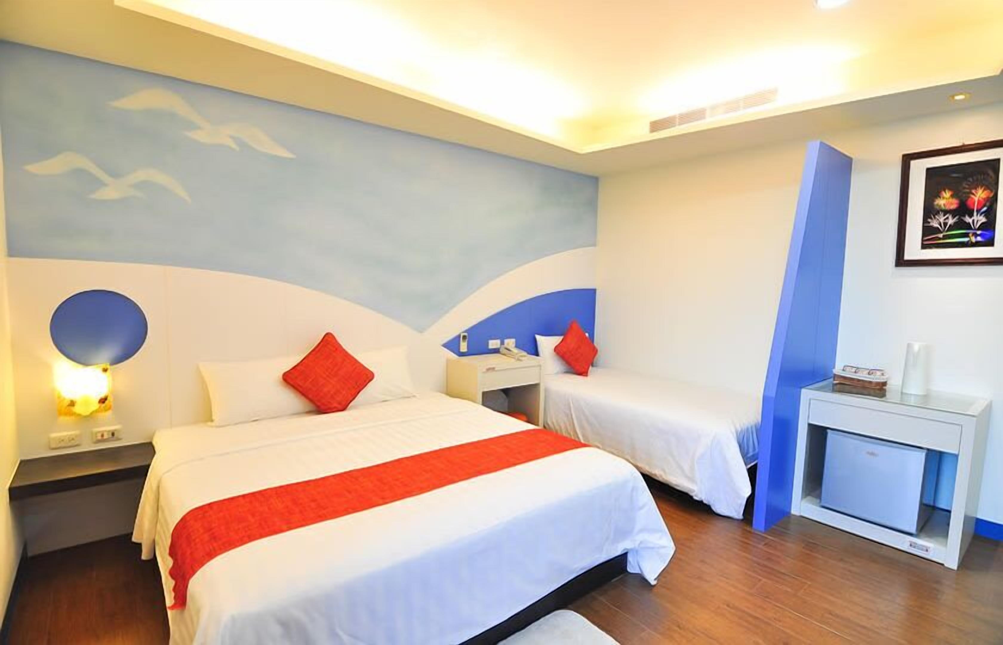 Chambre Triple Confort, plusieurs lits, non-fumeur, vue jardin