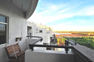 Signature Room, Multiple Beds, Non Smoking, Partial Sea View | Balcony view