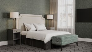 Colchones con pillow-top, minibar, escritorio y cortinas blackout