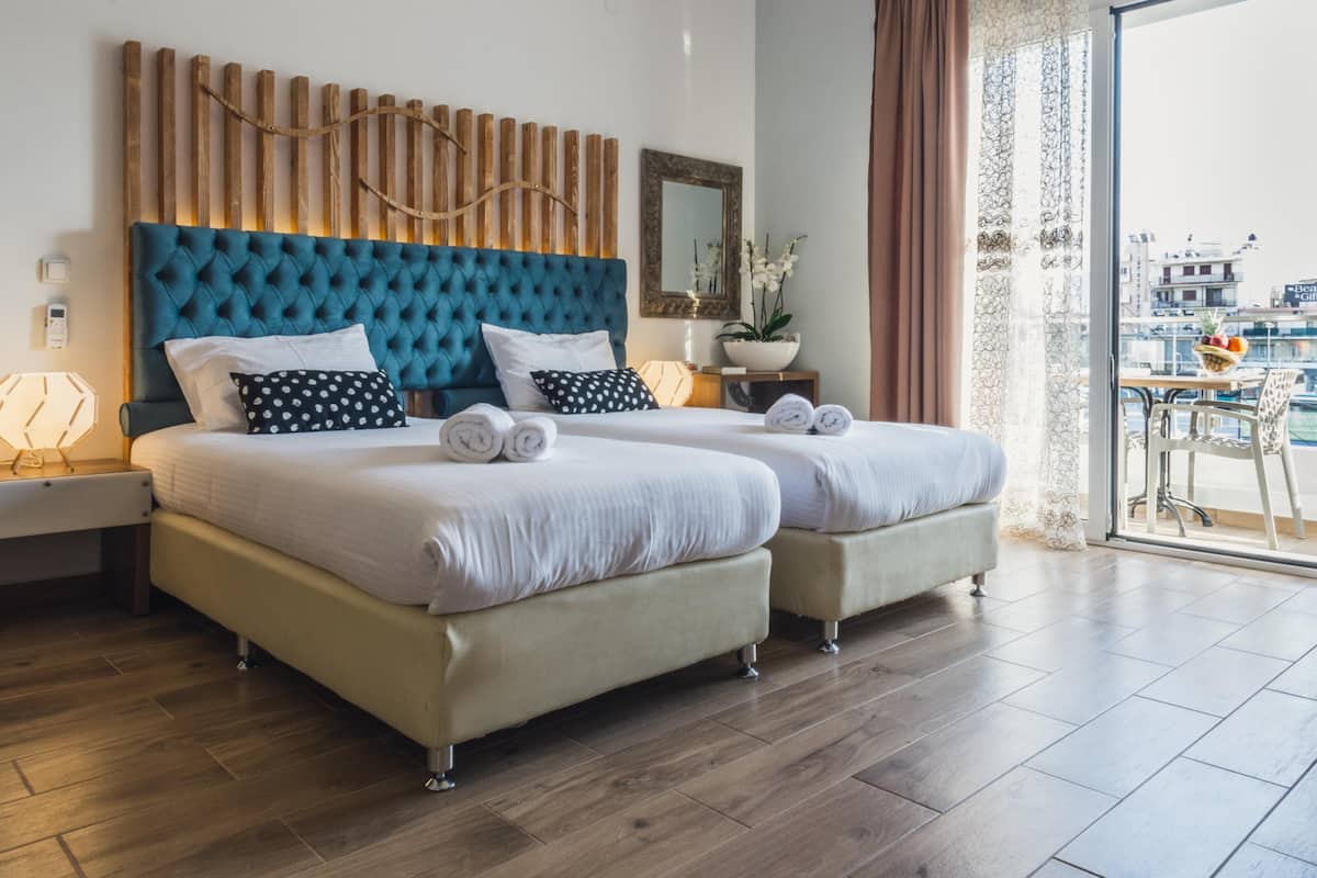 Triple Room, Balcony | 1 bedroom, in-room safe, laptop workspace, blackout curtains