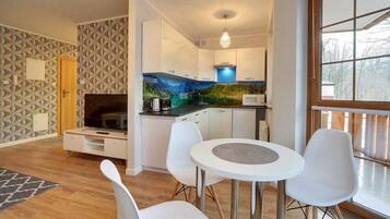 Apartamento (16/2) | Área de estar | TV de tela plana