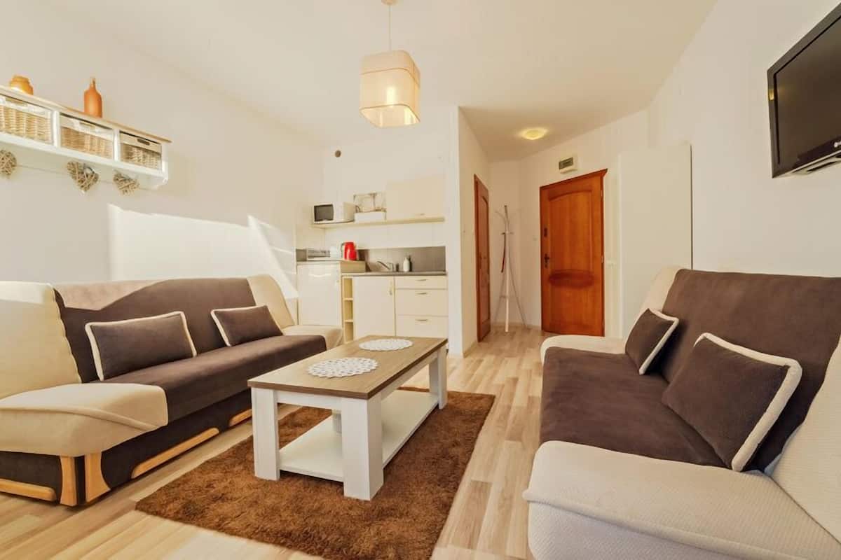 Apartment (3a/11) | Living area | Flat-screen TV