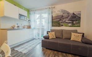 Apartment (3a/12) | Living area | Flat-screen TV