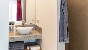 Shower, hair dryer, bathrobes, slippers