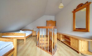 Tabla de planchar con plancha, wifi gratis y ropa de cama 