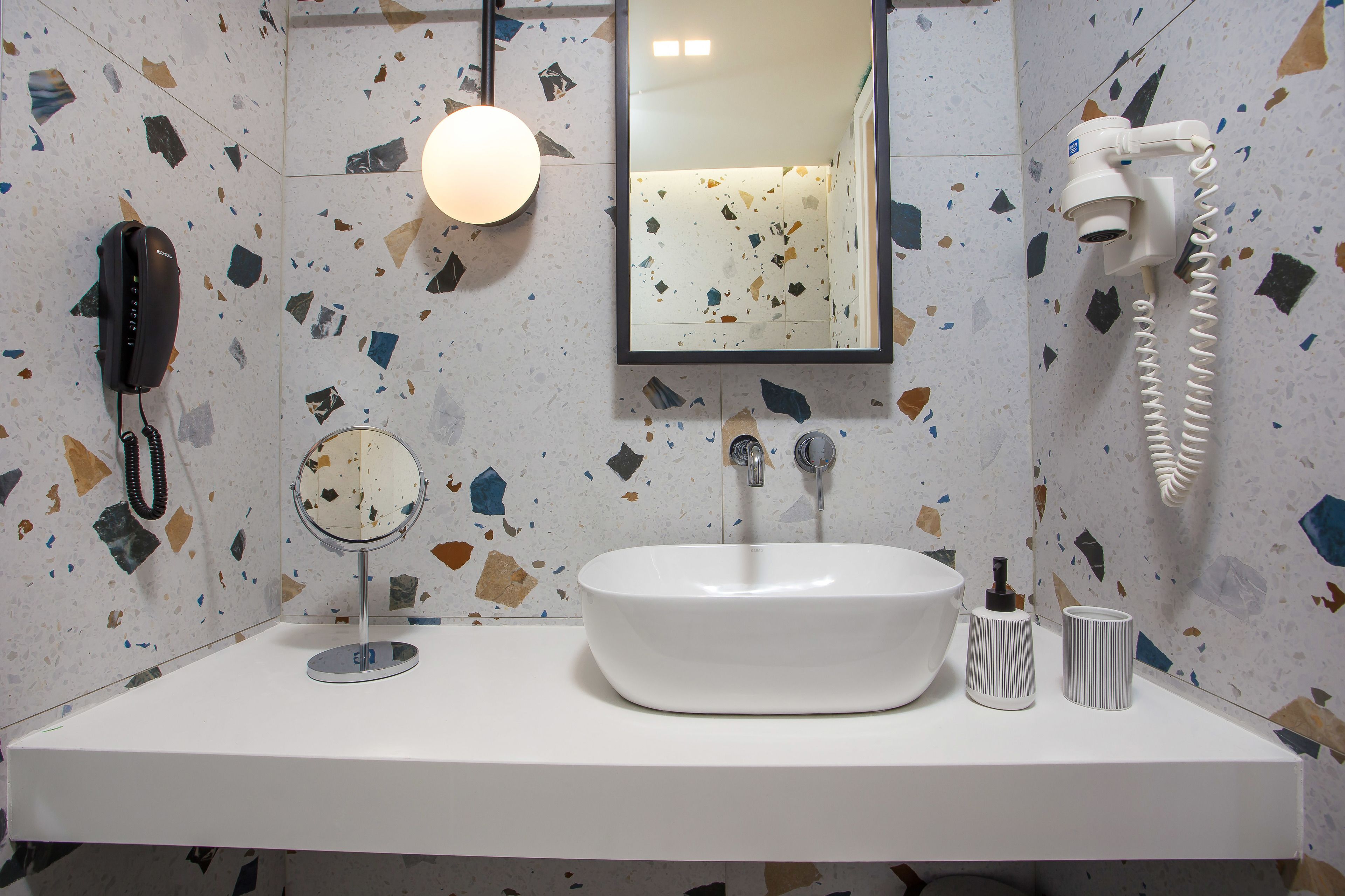 deluxe room | bathroom | shower, rainfall showerhead, free toiletries, hair dryer