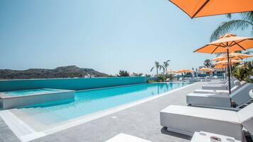 Outdoor pool, open 8:00 AM to 8:00 PM, pool umbrellas, sun loungers