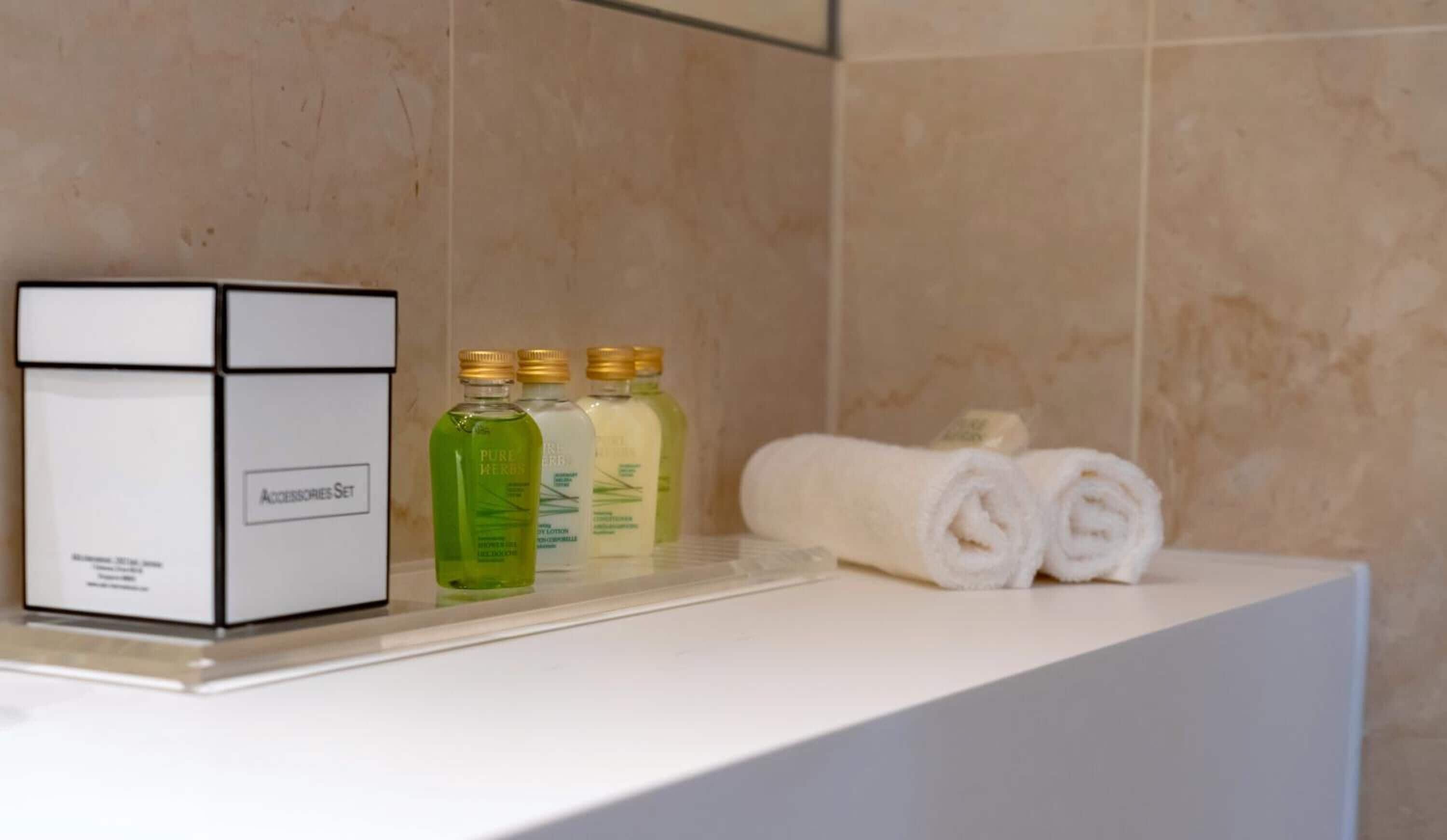 hair dryer, slippers, towels