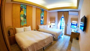 A hotel room with two beds, a desk with a computer, a TV, and a window with curtains. - C'est La Vie (Magong)