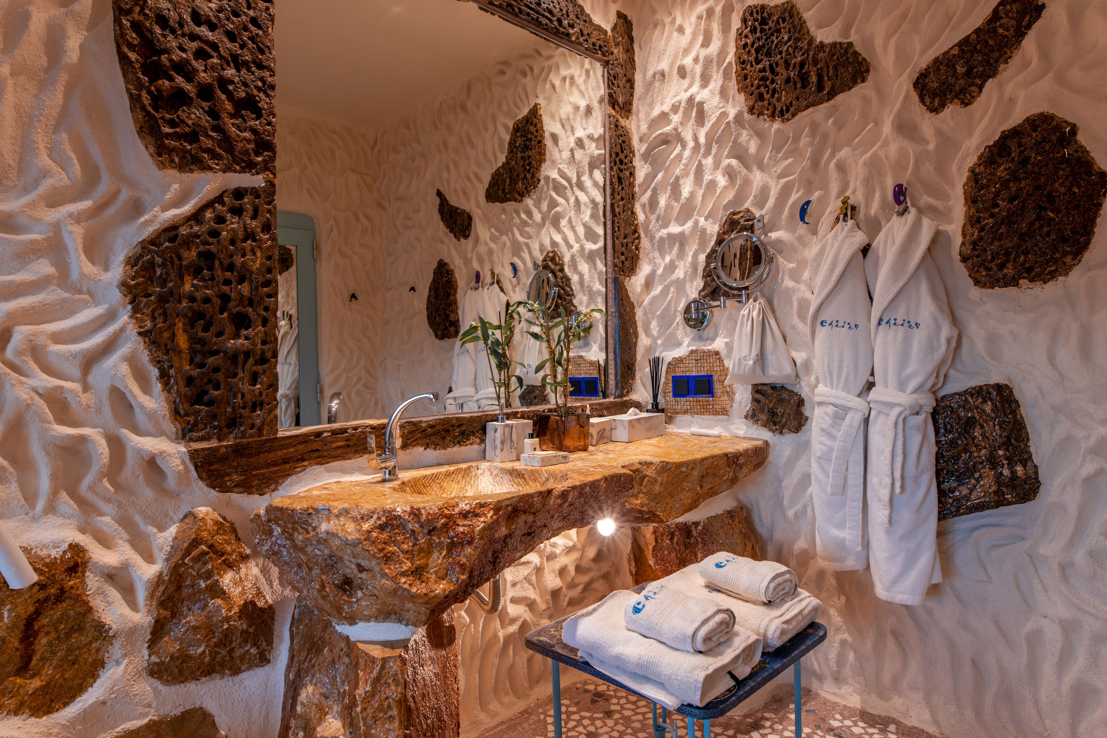 junior sea view with pond suite | bathroom | designer toiletries, hair dryer, bathrobes, slippers