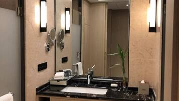 Separate tub and shower, hydromassage showerhead, hair dryer, bathrobes