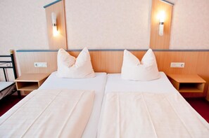 Escriptori, cortines opaques i habitacions insonoritzades 