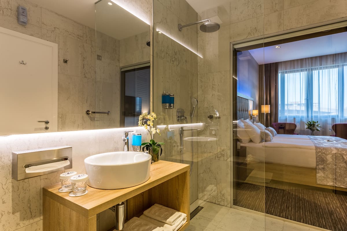 shower, free toiletries, hair dryer, bathrobes