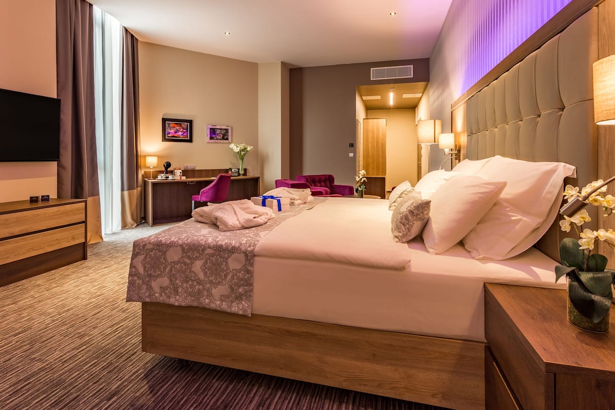 junior suite | minibar, in-room safe, desk, laptop workspace