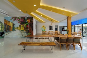 Family Villa, Private Pool, Garden View | Living area | Flat-screen TV, offices - Yellow Daisy Villa (Da Nang)