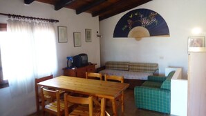 House, 3 Bedrooms | Living area - AffittaSardegna - Casa Coppia 2 (Olbia)