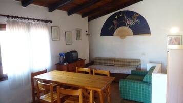 House, 3 Bedrooms | Living area | TV