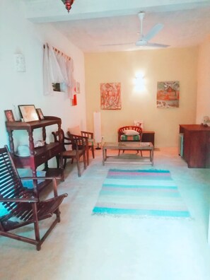 Standard Double Room, Pool View, Ground Floor | Living area